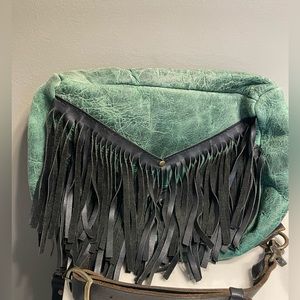 Sold Bird Trouble green leather backpack